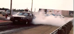 Ken's car doing a burnout